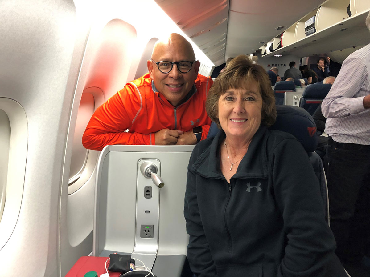 Cynthia and husband on plane